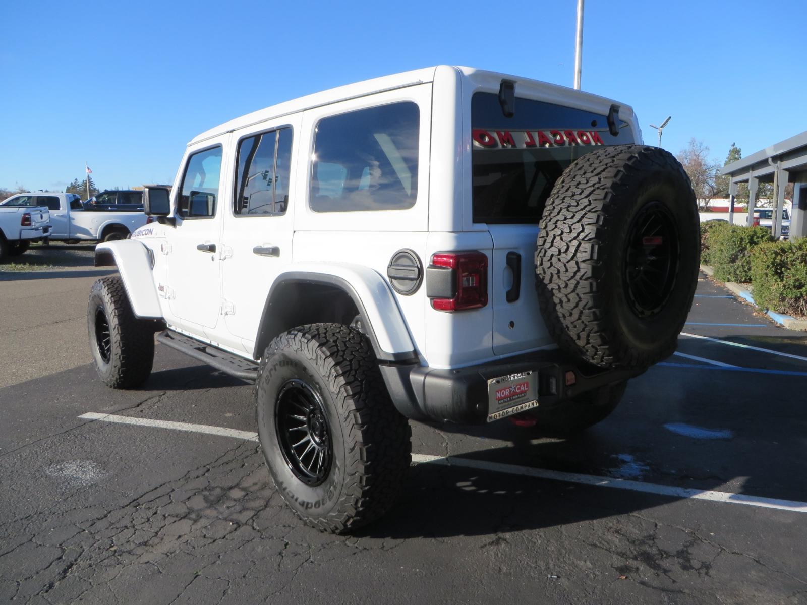 2020 White /TAN Jeep Wrangler Unlimited Rubicon (1C4HJXFG8LW) with an 3.6L V6 DOHC 24V FFV engine, 6A transmission, located at 2630 Grass Valley Highway, Auburn, CA, 95603, (530) 508-5100, 38.937893, -121.095482 - 3" Zone offroad suspension system, Fox adventure series shocks, rocksliders, Teraflex HD tire relocation, Mopar HD tailgate hinge, 17" KMC wheels, and 37" BFG KO2 tires. - Photo #6